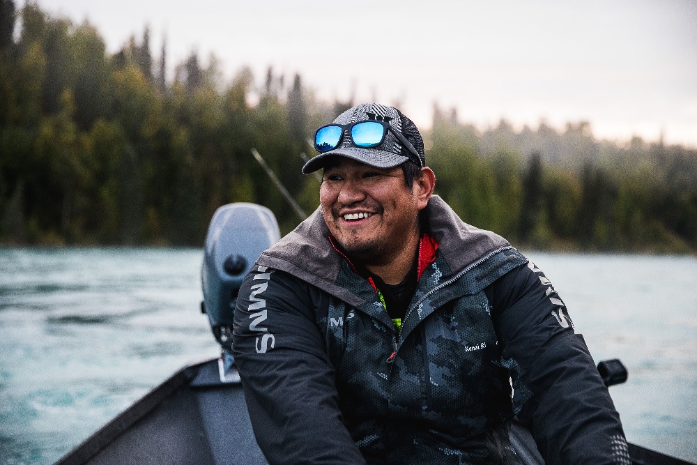 Man riding in boat on the kenai river